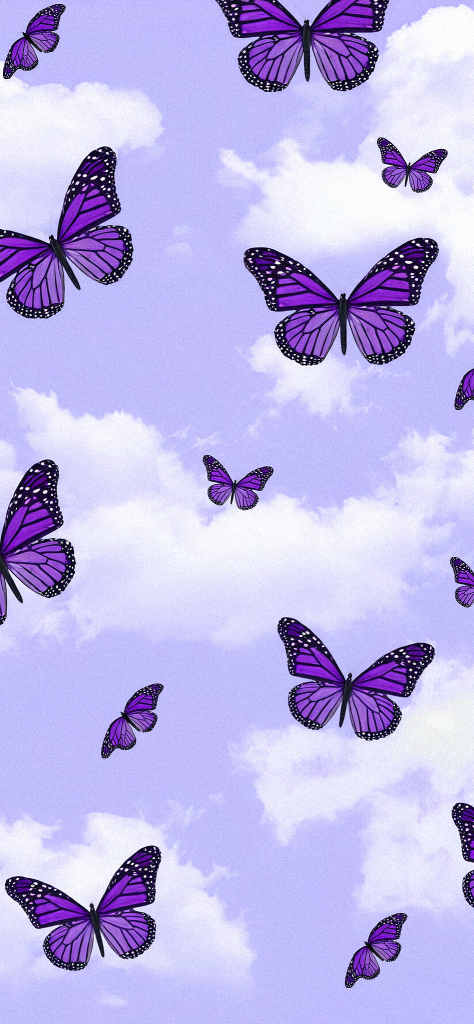 fondo de pantalla morado con mariposas monarcas moradas